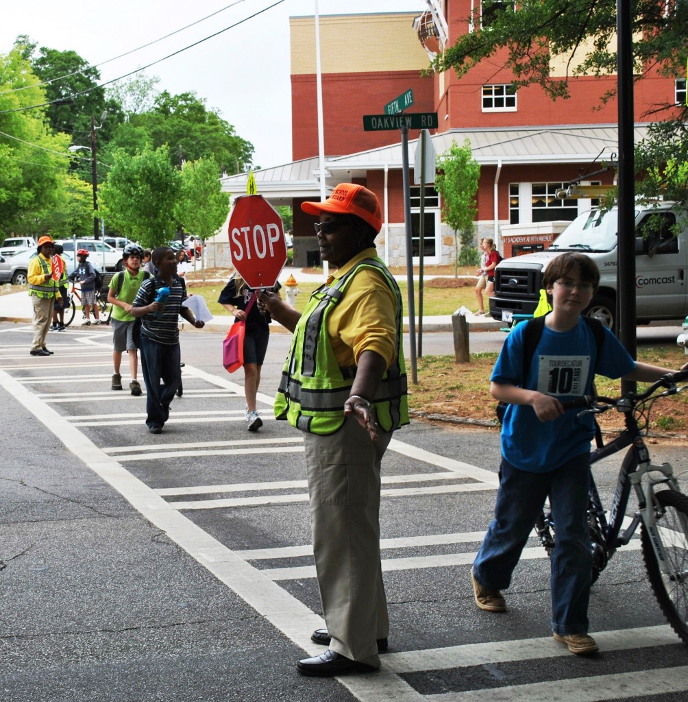 Crossing guards helping FAVE students after school.